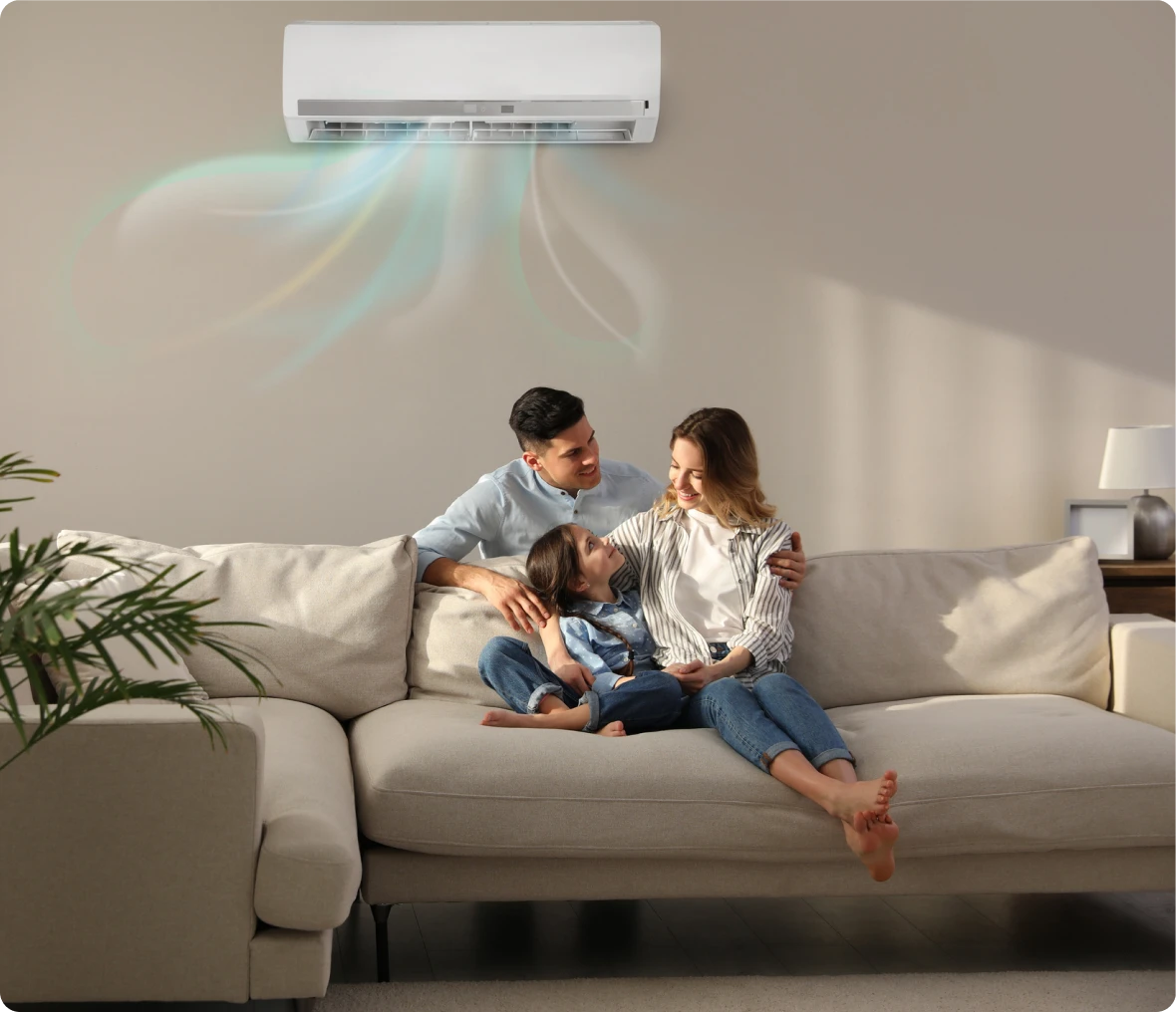 Family relaxing under air conditioner